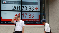 Asian shares mixed, Australia surges ahead of rate decision