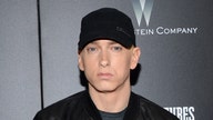 Eminem surprise album targets gun laws