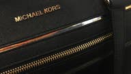 Michael Kors Holdings tops 3Q profit forecasts