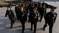 China Eases Foot Off Gas on Military Spending