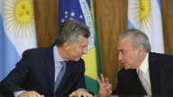 Brazil, Argentine presidents promise to lower trade barriers