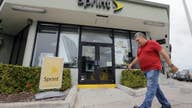 Sprint reports 3Q loss