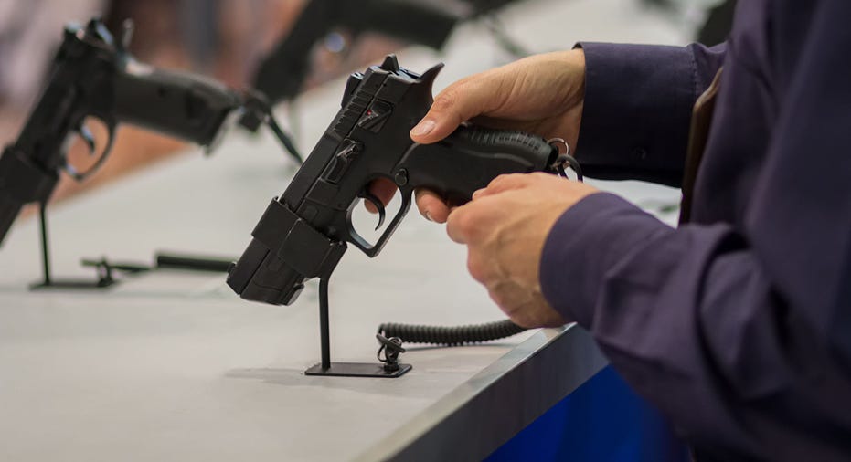 Gun in Hand iStock FBN