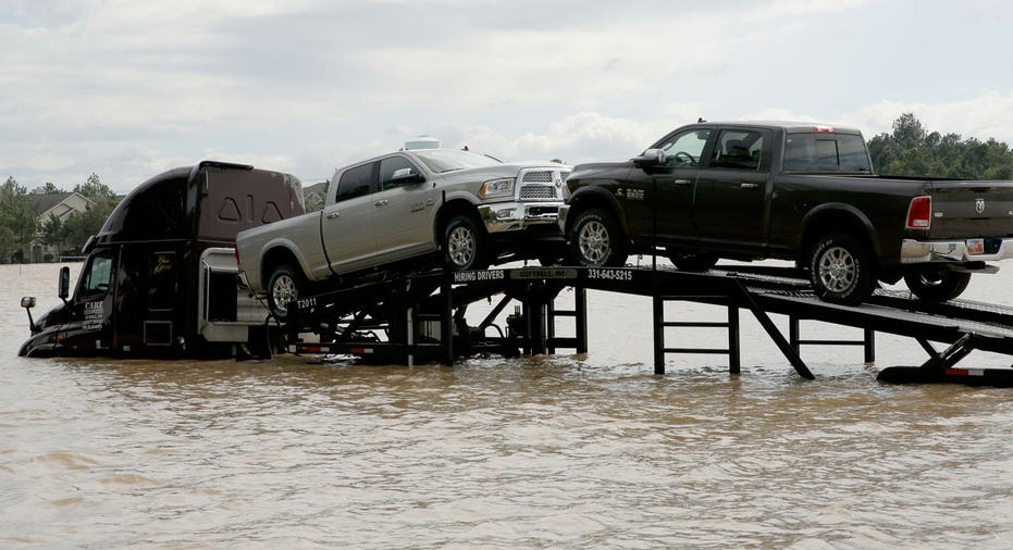 Hurricane Harvey stranded car transport truck AP FBN