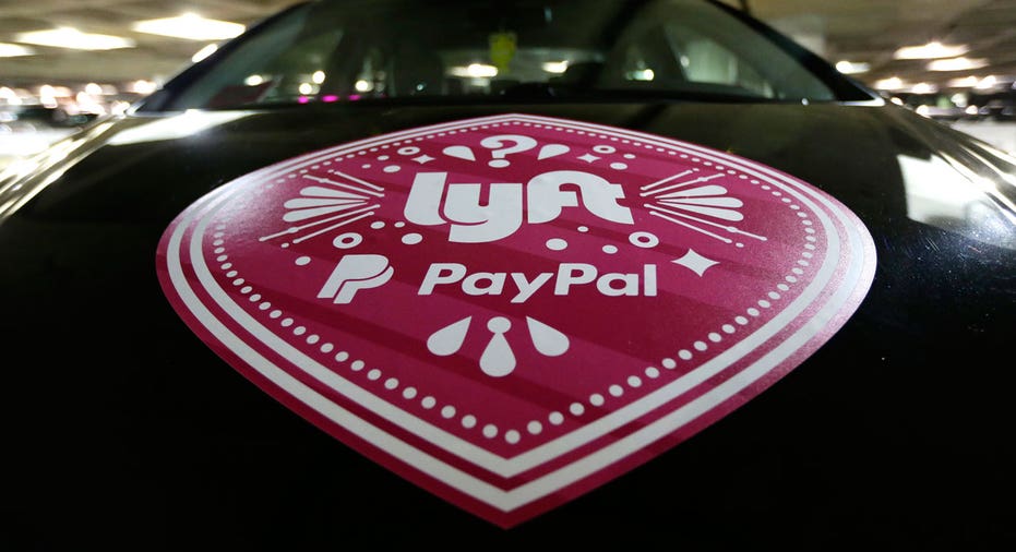 Lyft logo on hood of car FBN AP