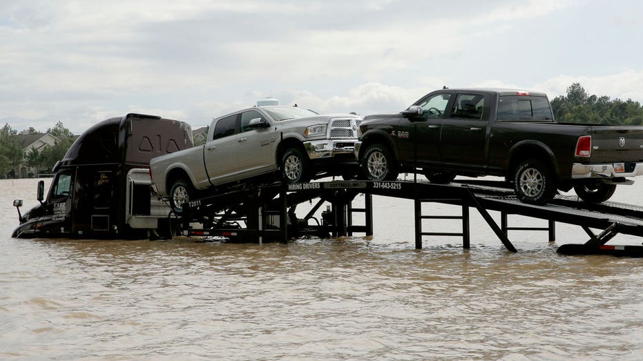 Hurricane Harvey stranded car transport truck AP FBN