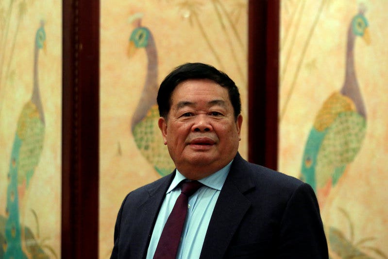 China's 'glass king' to complete U.S. expansion despite Trump tensions