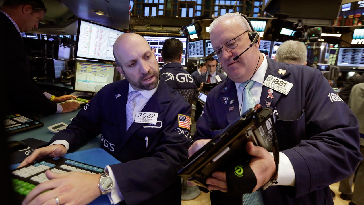 Stocks hit records as Fed minutes suggest inflation surge is temporary