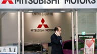 Japan raids Mitsubishi Motors over mileage-cheating scandal