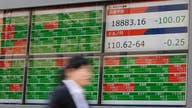 Asian shares mixed ahead of Trump-Xi meeting