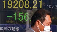 Asian shares mixed after Trump offers scant policy details