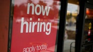 Companies struggling to hire workers, coping with rising prices, Fed says