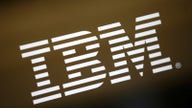 IBM beats revenue estimates; hints at sales growth