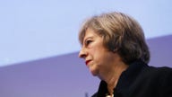 British PM May backs Cambridge Analytica investigation