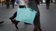 US consumers spending rises strongly, inflation moderates