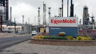 Exxon Mobil names Woods chairman, CEO to replace Tillerson