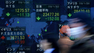 Global stocks sink as investors turn more cautious