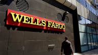 Wells Fargo cutting sales goal in wake of hefty fine