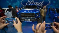 Ford's 3Q profit falls on recall, truck launch