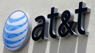 AT&T making nice with activist Elliott Management