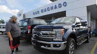 Pension change brings Ford 1st quarterly net loss since 2009