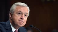 Wells Fargo CEO is out as bank grapples with sales scandal