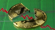 Bitcoin slumps below $10,000, half its peak, as regulatory fears intensify