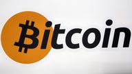 Bitcoin surges to new high on reports software 'fork' suspended