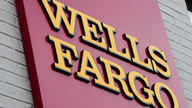 Wells Fargo shares sink after Federal Reserve crackdown