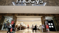 Macy's tops expectations, optimistic outlook sends shares up
