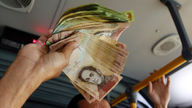 Venezuela drops overvalued exchange rate for state imports