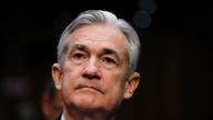 Fed's Powell sworn in, greeted with market turbulence