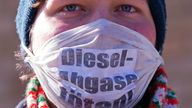 Cheers, protests as German court lets cities ban diesel cars
