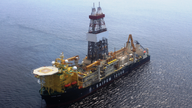 Cyprus says Turkish warships continue to block drilling rig