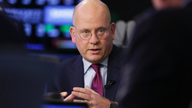GE reshapes board after retroactively cutting profits