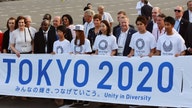 Japan vows no more deaths from overwork while building Olympic arena