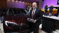 The Latest: Bolt, Ridgeline, Pacifica get auto show awards