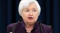 Fed keeps key rate unchanged but hints of coming hike