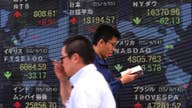 Asian Stocks Up After Bank of England Easing Signals