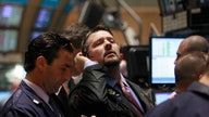 Health, Energy Stocks Hit Wall St, Microsoft Lifts Nasdaq