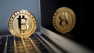 Buoyant bitcoin stirs cryptocurrency bubble fears