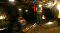 Clinton backs bill to protect benefits for ex-coal miners