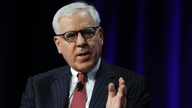 Carlyle's Rubenstein Sees a Rate Hike Later Rather Than Sooner