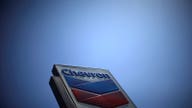 Chevron to end stock buybacks, cut 2020 spending
