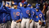 Cubs Deliver in Cleveland to Tie World Series