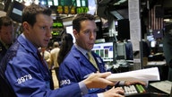 Dow closes at fresh high, tech selloff shoves Nasdaq from record