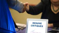 Applications for US unemployment benefits fall to 258,000