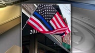 Pro-cop small business owner threatened over American flag