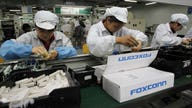 Foxconn eyes EVs for troubled Wisconsin plant, may go with Mexico