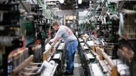 US manufacturers blame trade wars for slip in record-level optimism